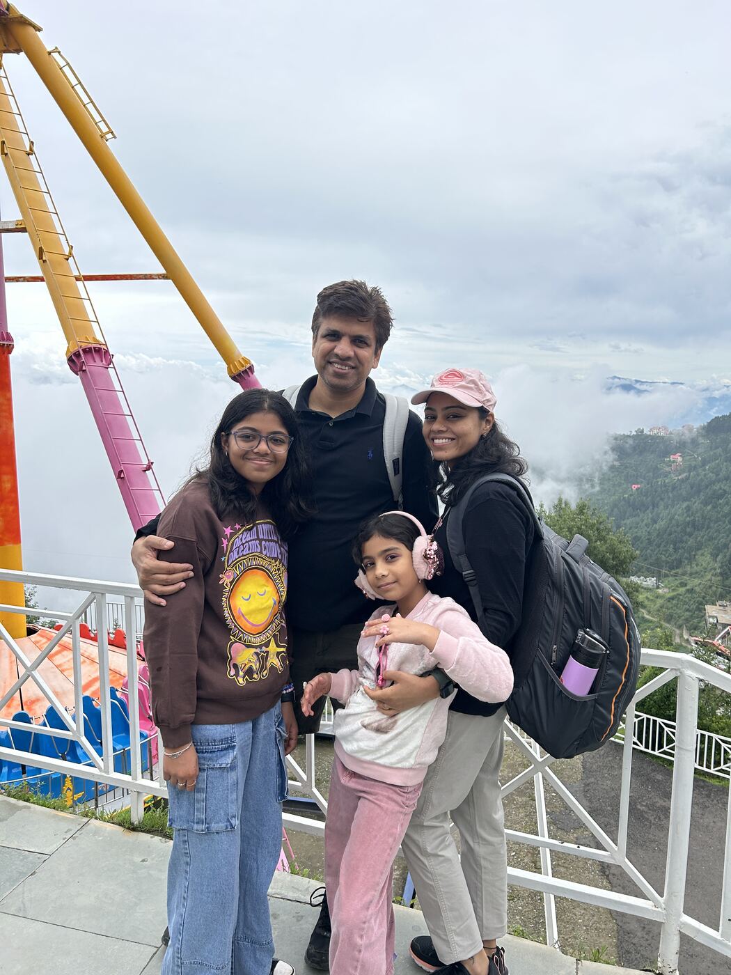 Naveen with his wife and two daughters